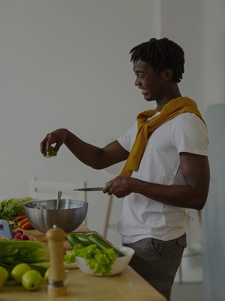 An african caterer preparing food