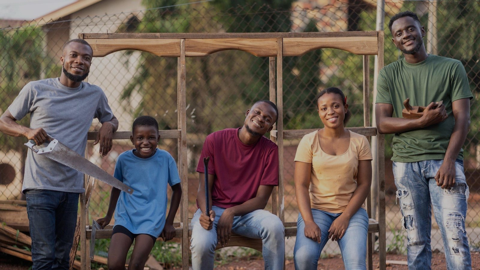 A group photo of young people in a community